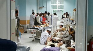 TOPSHOTS In this undated photograph released by Medecins Sans Frontieres (MSF) on October 3, 2015, Afghan MSF medical personnel treat civilians injured following an offensive against Taliban militants by Afghan and coalition forces at the MSF hospital in Kunduz. An air strike on the hospital in the Afghan city of Kunduz on October 3 left three Doctors Without Borders staff dead and dozens more unaccounted for, the medical charity said, with NATO conceding US forces may have been behind the bombing. The MSF facility is seen as a key medical lifeline in the region and has been running "beyond capacity" during recent fighting that saw the Taliban seize control of the provincial capital for several days. AFP PHOTO / MSF ----EDITORS NOTE---- RESTRICTED TO EDITORIAL USE - MANDATORY CREDIT "AFP PHOTO/MSF" - NO MARKETING NO ADVERTISING CAMPAIGNS - DISTRIBUTED AS A SERVICE TO CLIENTS -----